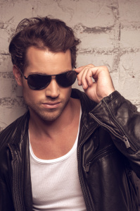 Portrait of sexy man in sun glasses.